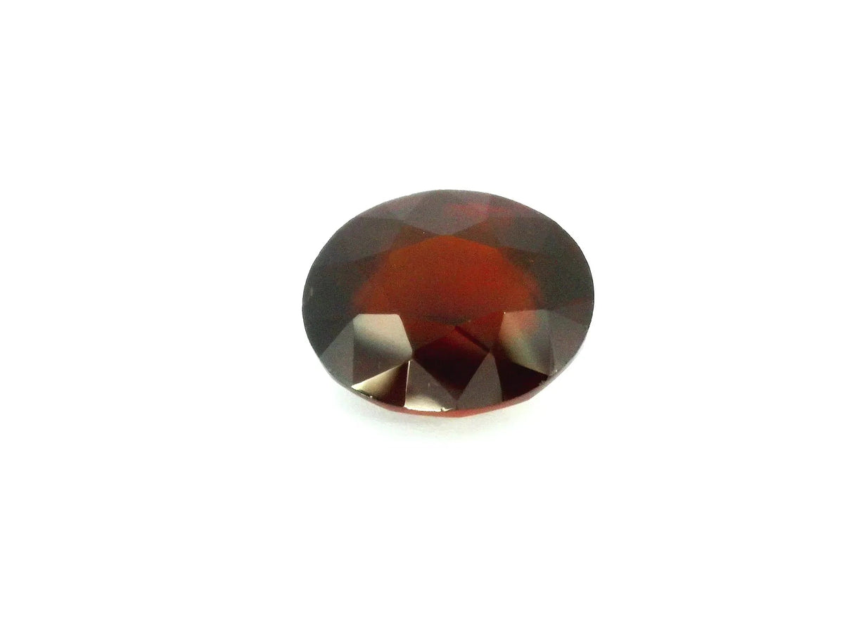 6.54ct Oval Natural Garnet (Colour Orange, Clarity Slightly Included, Cut Faceted) - The Carat Club