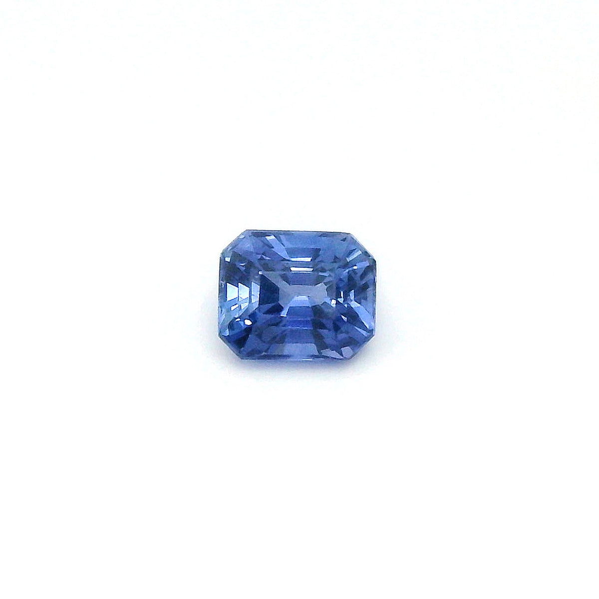 octagon cut blue sapphire on white background