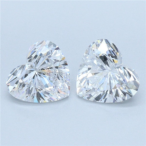 Matched pair of heart diamonds shown rotating to display brilliance and matching proportions