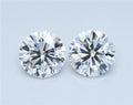 Matched pair of round diamonds shown rotating to display brilliance and matching proportions